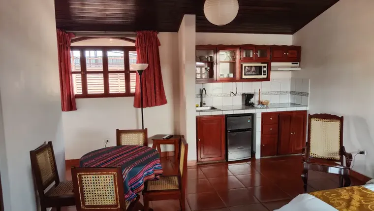 The kitchen and dining area of room 1